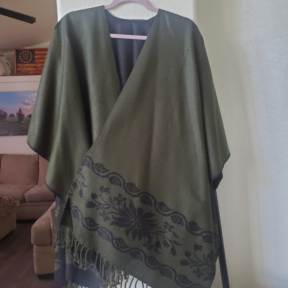 Poncho. Dark green and black. No tags to tell the textile blend.